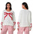 Felix – Festlicher Strickpullover mit Schleifen-Design
