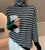 Mia - Eleganter Pullover mit schwarz-weißem Karomuster
